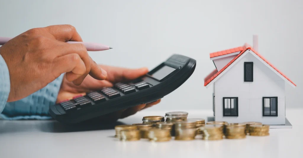 man calculating how much deposit needed for home loan in australia